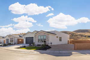 View of front of home with a garage