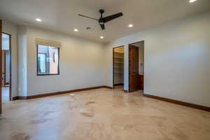 Unfurnished room featuring ceiling fan