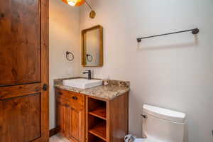 Bathroom with vanity and toilet