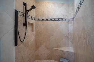 Bathroom with a tile shower