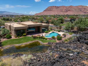 Exterior space featuring a mountain view and a patio