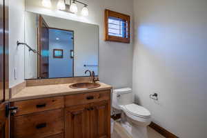 Bathroom with vanity and toilet