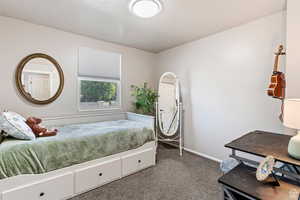 View of carpeted bedroom