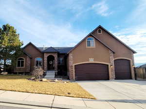 View of front of house featuring a front lawn