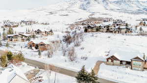 Snowy aerial view with a mountain view