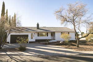 View of front of home with a garage