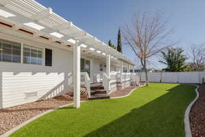 View of yard featuring a pergola