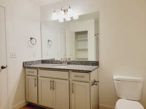 2nd bedroom suite attached bathroom with single vanity