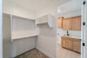 Walk in closet with sink