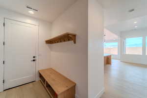 Mudroom featuring light hardwood / wood-style floors