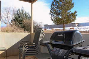 View of patio featuring area for grilling