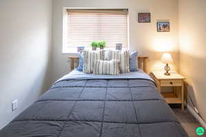 Bedroom 3 with carpet and baseboards