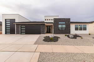 View of front facade with a garage