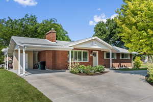 Single story home with a carport