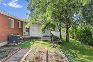 View of yard featuring central AC