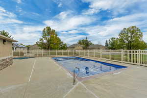 View of pool with a patio