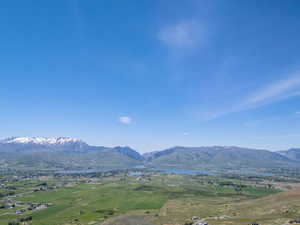 Mountain view featuring a nearby body of water