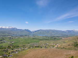 Mountain view featuring a nearby body of water