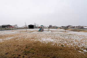 View of yard featuring a playground