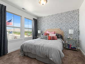 Bedroom with carpet flooring