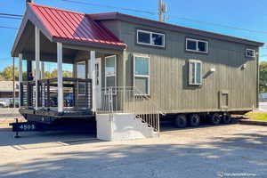 Exterior space with a porch