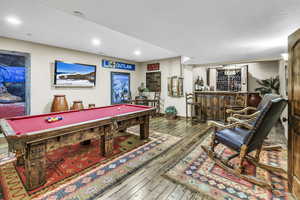 Old west billiard room with rustic bar and large, temperature-controlled wine storage (lower level)