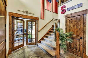 Foyer with french doors opening to office