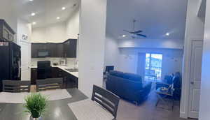 Dining area featuring visible vents, recessed lighting, high vaulted ceiling, and a ceiling fan