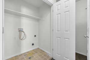 Washroom with hookup for an electric dryer and washer hookup