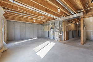 Basement with gas water heater and heating unit