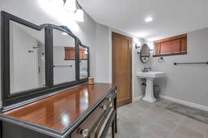 Bathroom featuring tile patterned flooring