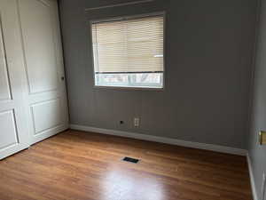 Spare room with light wood-type flooring