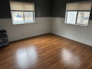 Unfurnished room with light hardwood / wood-style floors