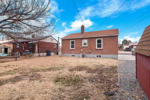 Rear view of house with central AC unit