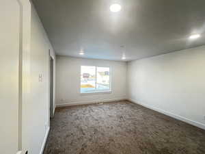 View of carpeted empty room