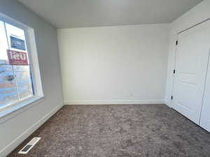 View of carpeted spare room