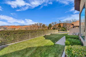 View of yard with a mountain view