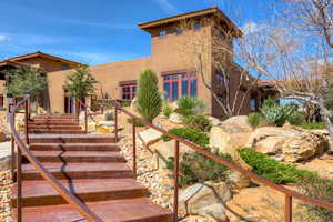 View of front facade featuring a garage