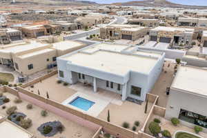 Birds eye view of property featuring a mountain view