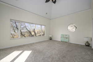 Empty room featuring carpet flooring and ornamental molding