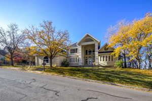 View of front of house with a front yard