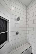 Bathroom with tiled shower