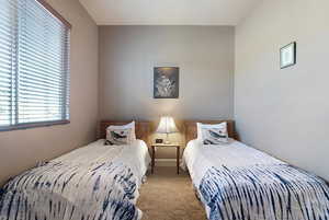 Bedroom featuring carpet flooring