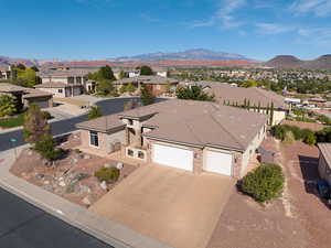 Birds eye view of property with a mountain view