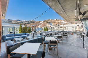 View of patio featuring a mountain view and outdoor lounge area