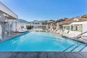 View of pool featuring a mountain view