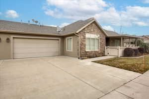 Single story home featuring a garage