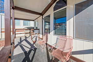 Balcony featuring a porch