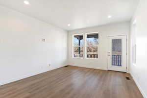 Spare room with light hardwood / wood-style flooring