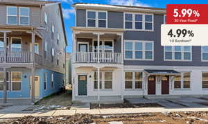 View of front of home featuring a balcony